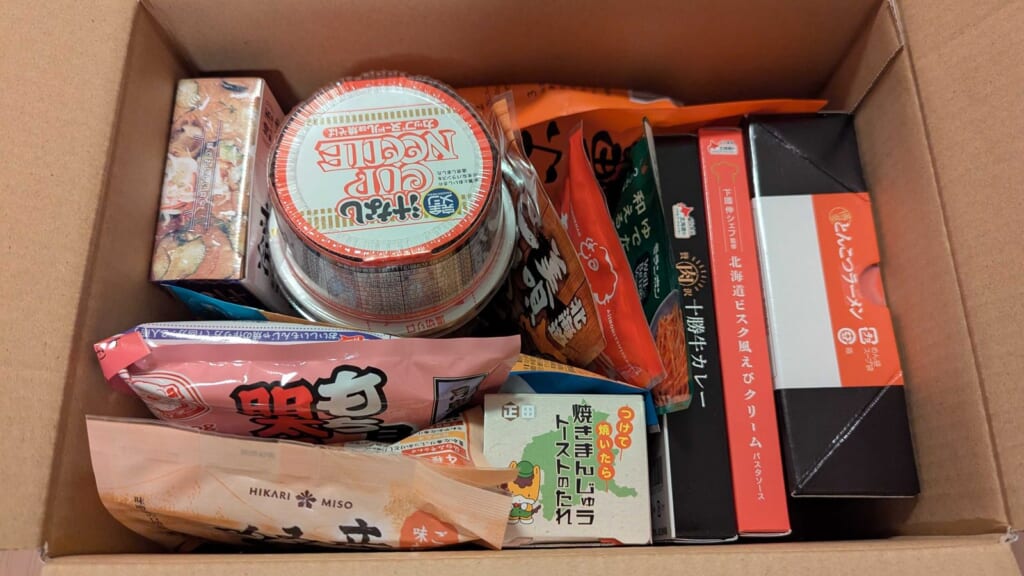 4994 大成ラミック 株主優待 3月優待 段ボール箱に入った食品の詰め合わせ